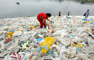Woman sifting through plastic bags